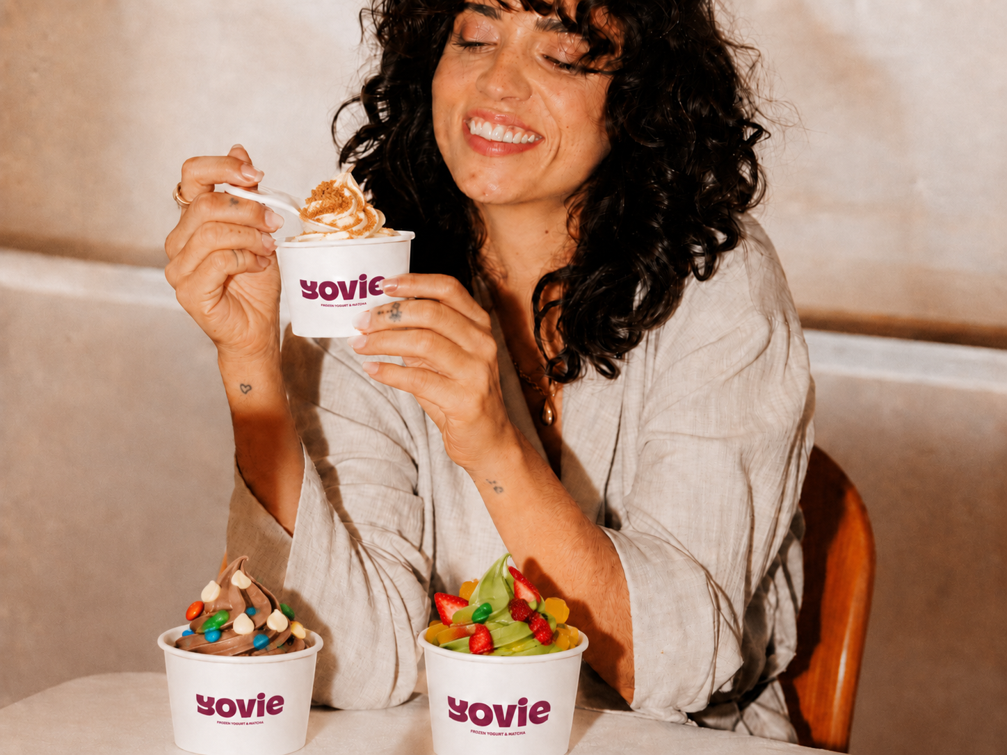Three YOVIE frozen yoghurt cups with toppings — matcha dessert franchise menu in Australia